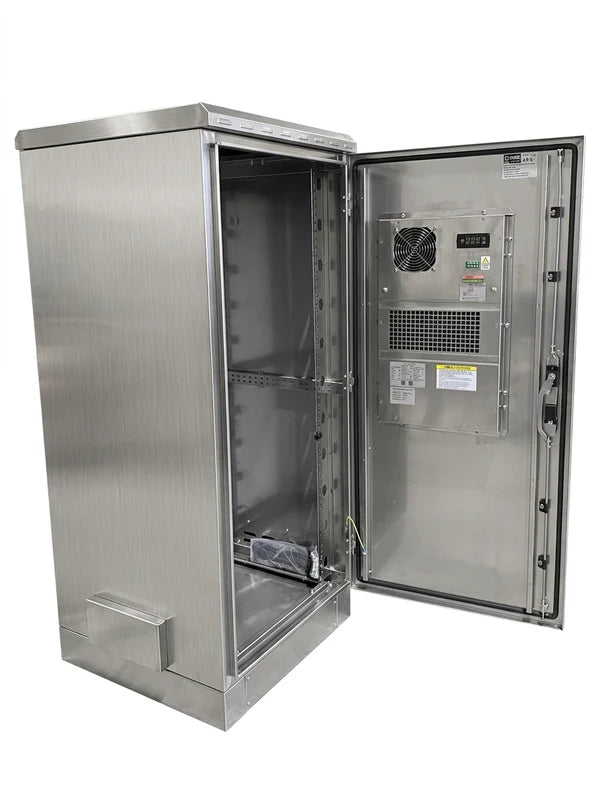 Stainless steel cabinet open door with the AC unit visible inside the bay